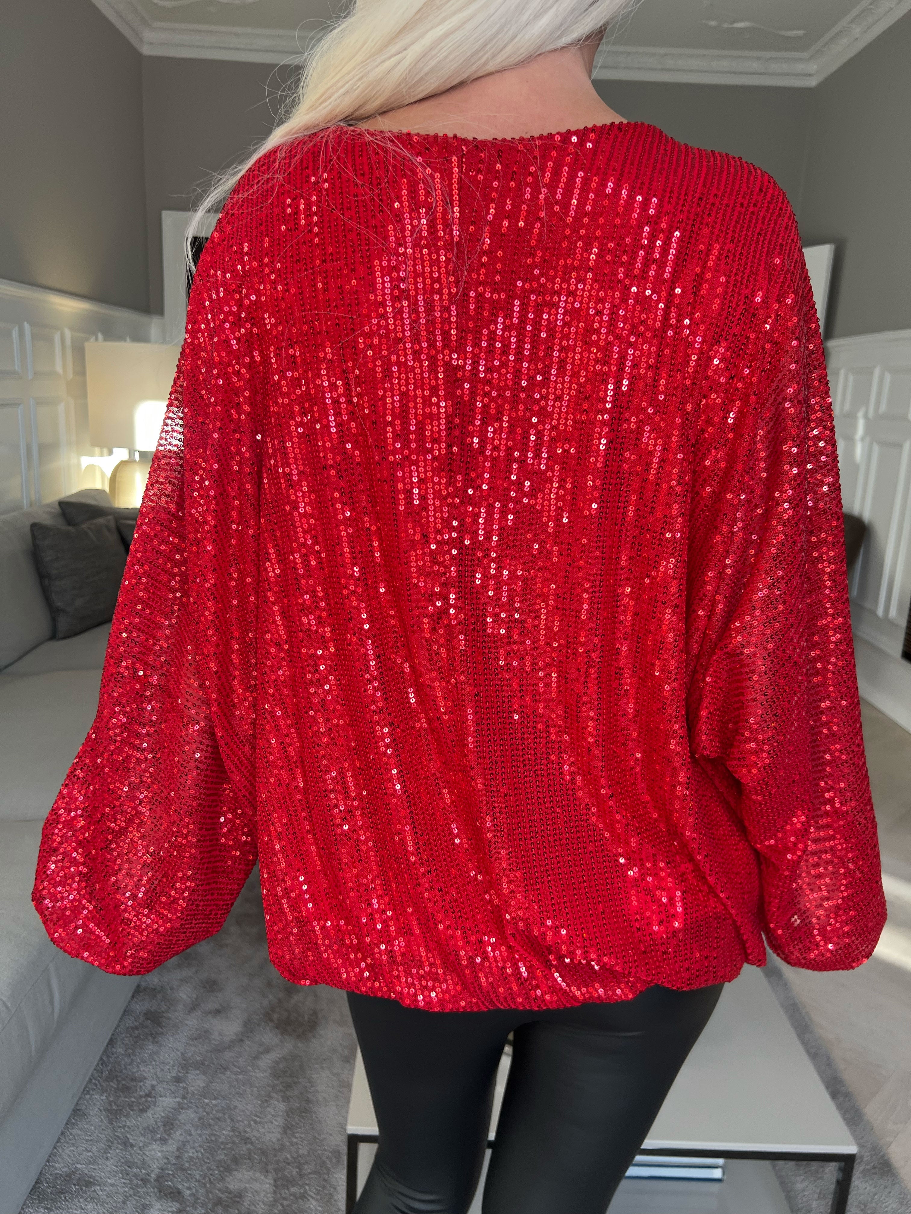 Destiny - Paljettblus med fladdermusärmar